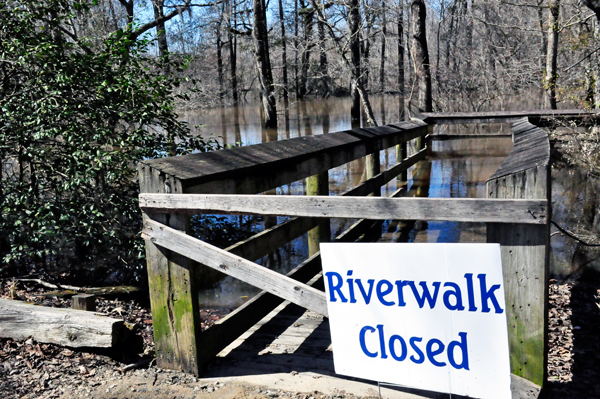 Riverwalk closed sign